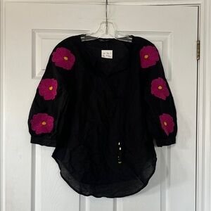 Elegant Black Blouse with Vibrant Pink Floral Design